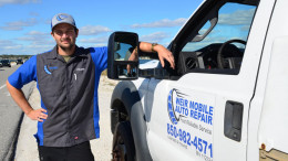 ASE-Certified Master Mechanic, Chase Weir, standing by mobile auto repair service truck in Navarre, FL
